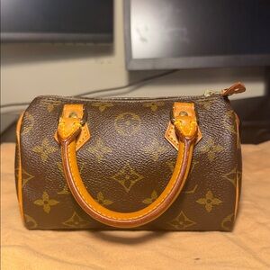 Louis Vuitton Speedy NANO
 TH0915